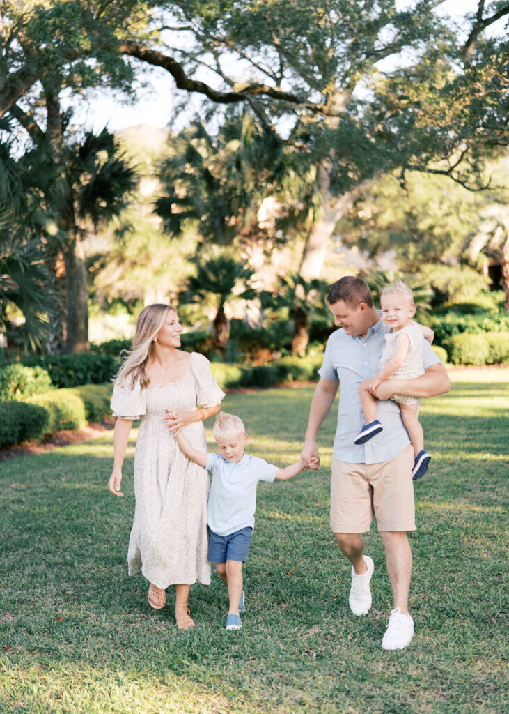 family walking in kiawah island wearing neutral clothes
